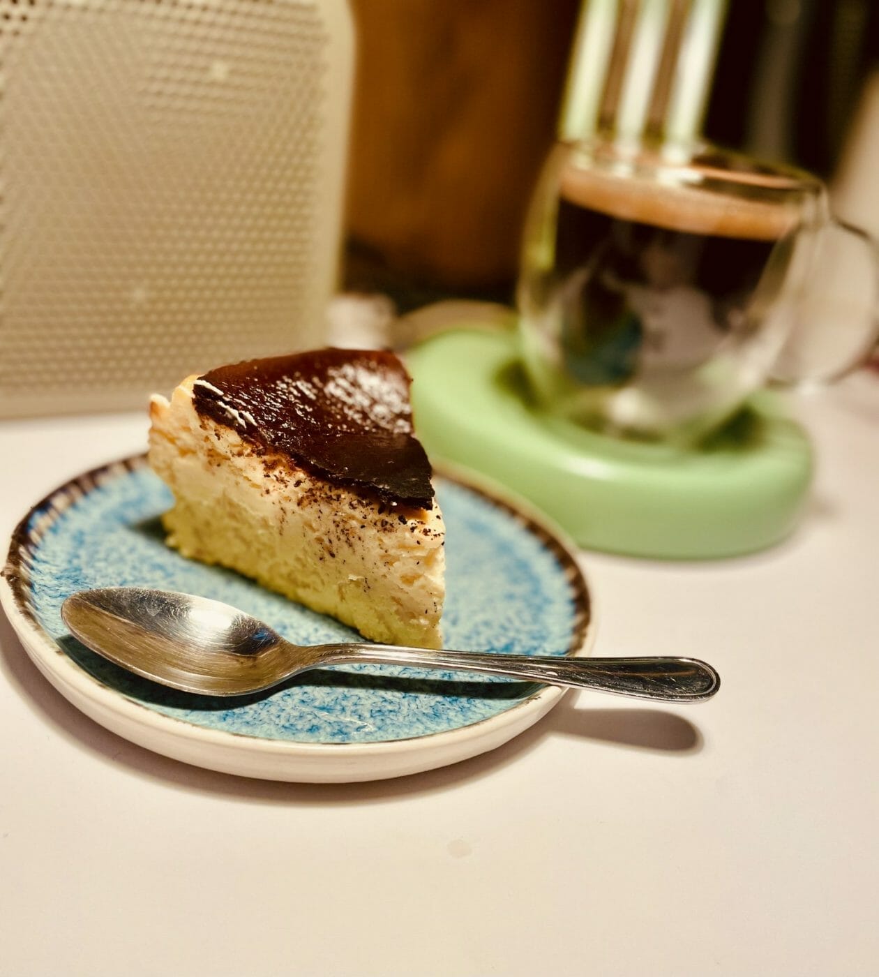 chilled cheesecake and hot black coffee